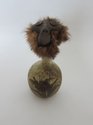 Francis Upritchard, Hairy Monkey Bottle, 2011, modelling material, foil, found buttons, ceramic, leather and fur, 230 x 105 x 115 mm 