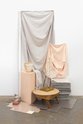 Eve Armstrong, Like Breathing, 2011, sheet, table cover, tiles, ceramics, display stands, newspaper, newsprint, table top, table legs, gib board, paving stone, packaging. Courtesy the artist and Michael Lett, Auckland