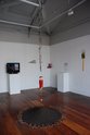 The Chinese Horoscope Show at Enjoy. On the left Eugenia Raskopoulos, Waiting for Lass, 2010, DVD, duration: 2.38. Next to it is Ruth Thomas-Edmond's Snakeskin, 2012, ink on paper. On the other plinth is Liyen Chong's Goat Soup, 2012, Printed paper.