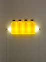 Bill Culbert, Four Yellow, 2010, plastocbottles, 60cm fluorescent tube and components. Courtesy of the artist and Sue Crockford 