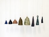 Kate Newby, It's an option not to feel bad about it, 2013 set of 8 ceramic bells (stoneware, porcelain, terracotta glaze) installed in stairwell. Dimensions vary, approx. 250 x 600 x 150 mm overall