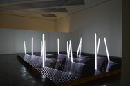 Bill Culbert and Ralph Hotere, Blackwater 1998-99, lacquer on corrugated aluminium, fluorescent tubes, cables, wood. Collection of the Museum of New Zealand Te Papa Tongarewa. Courtesy the Hotere Foundation Trust. Photo: Kevin Dornauf