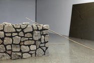 Bianca Hester: Concrete rubble wall, 2015, recycled concrete, mortar, oxide, constructed by Paea Veamoi (Stoneage Fencing); Bronze rod, 5.6 metres; Ply wall and branch, painted found ply, cast bronze branch with black patina. Photo: Sam Hartnett