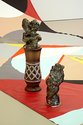 Mikala Dwyer, Backdrop for Rounders, 2016, acrylic on canvas, glazed ceramic, wooden base, glitter. Three elements. Backdrop: 6000 xx 2200 mm, ceramics: 300 x 100 x 100 mm, 560 x 100 x 100 mm