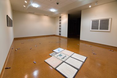 Installation of Campbell Patterson's 'toot floor' exhibition in the Hocken Collections Gallery