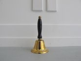 Lance Pearce, Fr Brian Keogh, Abbot at Kopua Monastery, has loaned out the bell used to call guests together for meals, 2019