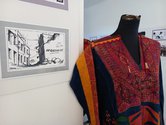 Palestinian thobe with Evans anti-apartheid cartoon--at Gallery Anomalous, Waiheke in the State of Palestine exhibition